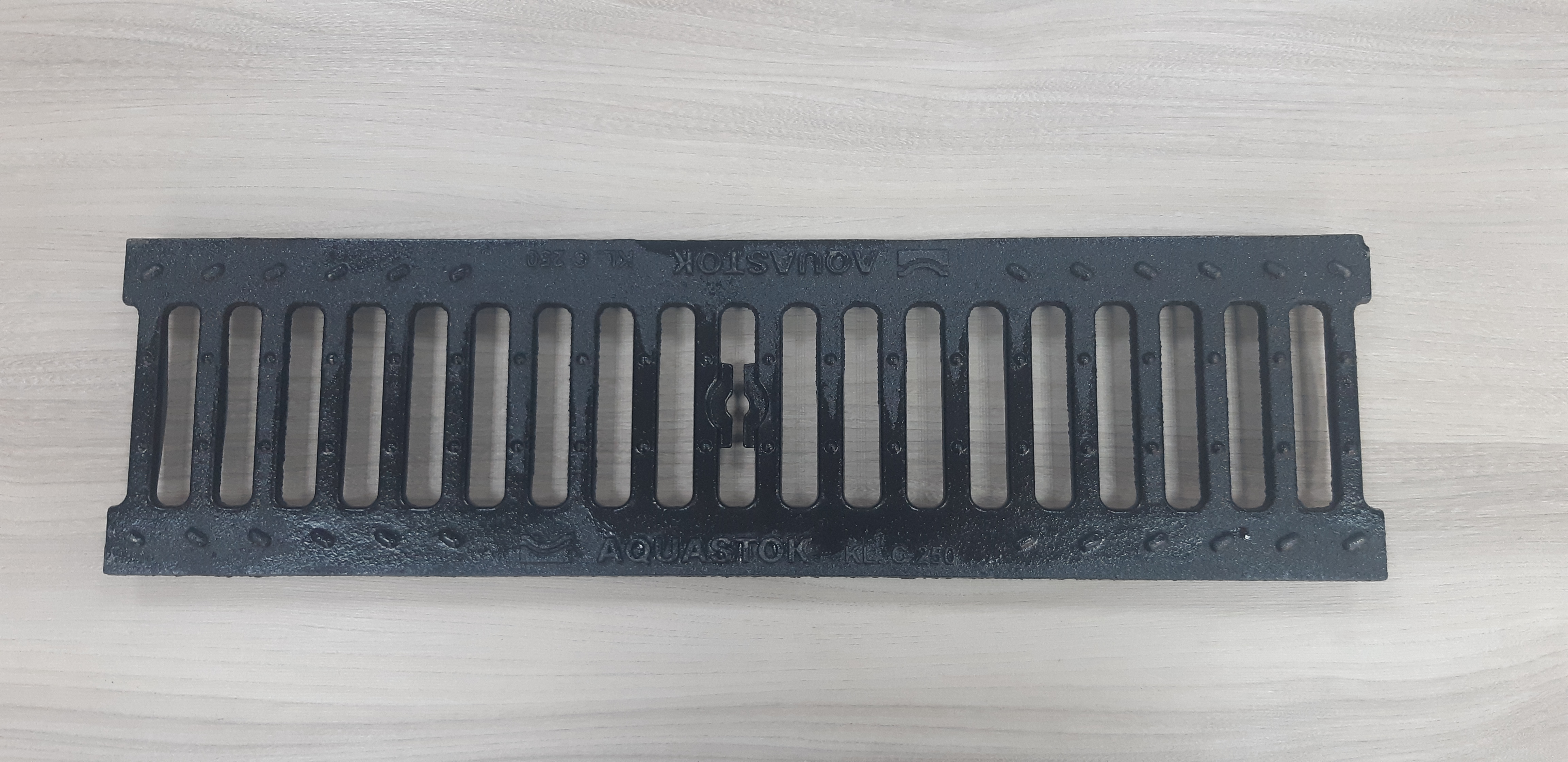 Решетка чугунная щелевая Norma DN100 C250 (500х136х15)